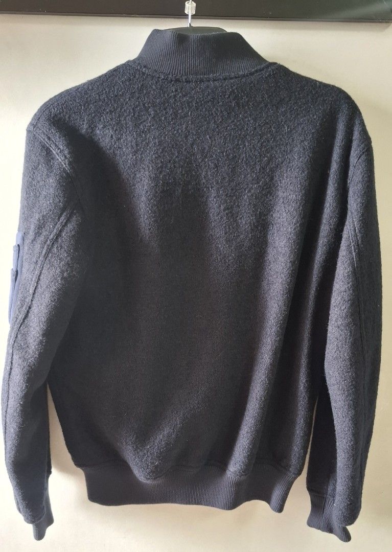 8 Seconds Navy Blue Wool Bomber Jacket (Category: Coats, Jackets and Outerwear) located in Taguig. Submitted by atticusmerch (Listing ID 1470780450, Image 2). Description: - Brand: 8 Seconds - Size: M - Color: Navy Blue - Material: Textured wool-blend exterior with smooth inner lining - Closure: Full zip front - Details: Ribbed collar, cuffs, and hem - Pockets: Two front flap pockets with smooth contrast trim - Condition/Style: Clean shape, warm 