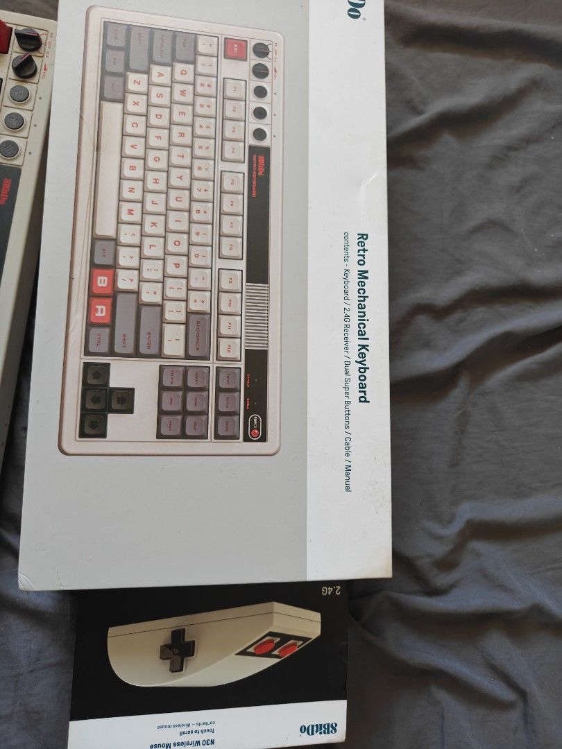 8BitDo Retro Mechanical Keyboard and Retro N30 Mouse (Category: Computer Keyboard) located in Tarlac. Submitted by raphocehcap (Listing ID 1469050906, Image 3). Description: - 8BitDo Retro Mechanical Keyboard and matching R8 Mouse - Condition: Like new, unboxed with original packaging included - Design: Classic retro aesthetic in grey and beige with striking red accents - Connectivity: Tri-mode wireless (2.4G, Bluetooth, and wired USB) - Perfect 