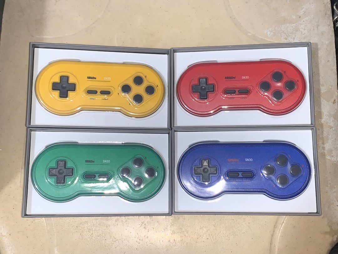 8BitDo SN30 Bluetooth Red Blue Yellow Gree Controller Limited Edition PC Nintendo Switch Mac (Category: Controllers) located in Taguig. Submitted by paradise.collections (Listing ID 1470879457, Image 2). Description: - 8BitDo SN30 Bluetooth Gamepad Controller Set - Available in 4 vibrant colors: yellow, red, green, and purple - Multi-platform compatibility: Switch, Windows, Android, macOS, and Steam - Brand new in original packaging with clear pl