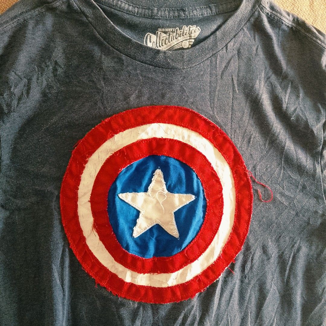 - Brand: Old Navy Collectabilitees — Marvel licensed (Category: Tshirts & Polo Shirts ) located in Manila. Submitted by jonahq.9 (Listing ID 1470769705, Image 2). Description: Old Navy x Marvel Captain America Tee 🛡️ Appliqué shield design! Official Marvel merch, soft navy cotton. Preloved great condition. DM to claim! 📩 - Hashtags: #CaptainAmerica #MarvelTee #OldNavyCollectabilitees #SuperheroTee #LicensedMerch #PrelovedPH.