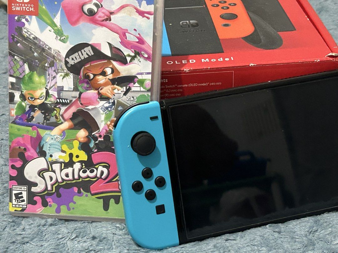 🎮 NINTENDO SWITCH OLED COMPLETE SET + SPLATOON + DIGITAL GAMES (Category: Nintendo) located in Manila. Submitted by gentlebear_7aebaf (Listing ID 1470905273, Image 3). Description: 🎮 NINTENDO SWITCH OLED COMPLETE SET + SPLATOON + DIGITAL GAMES Selling my Nintendo Switch OLED! ✅ Nintendo Switch OLED console ✅ Complete accessories ✅ Joy-Con controllers ✅ Splatoon game included ✅ Ready to use and enjoy! 📌 Buyer is welcome to test the unit before 