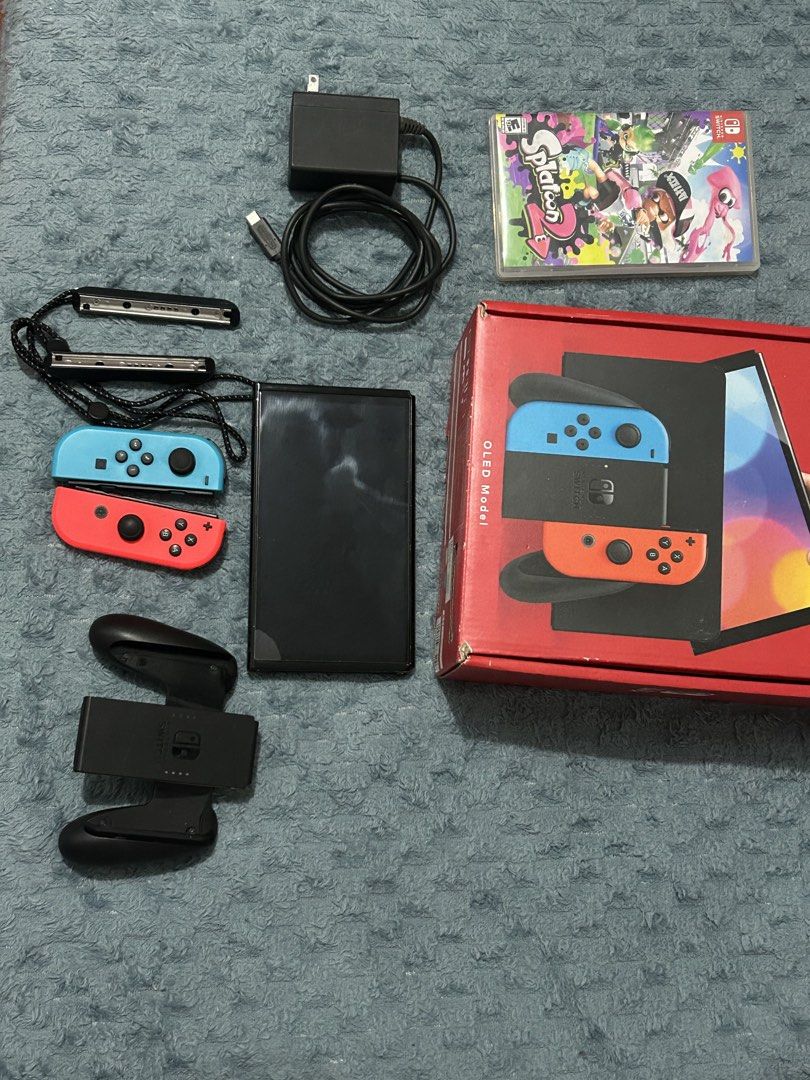 🎮 NINTENDO SWITCH OLED COMPLETE SET + SPLATOON + DIGITAL GAMES (Category: Nintendo) located in Manila. Submitted by gentlebear_7aebaf (Listing ID 1470905273, Image 2). Description: 🎮 NINTENDO SWITCH OLED COMPLETE SET + SPLATOON + DIGITAL GAMES Selling my Nintendo Switch OLED! ✅ Nintendo Switch OLED console ✅ Complete accessories ✅ Joy-Con controllers ✅ Splatoon game included ✅ Ready to use and enjoy! 📌 Buyer is welcome to test the unit before 