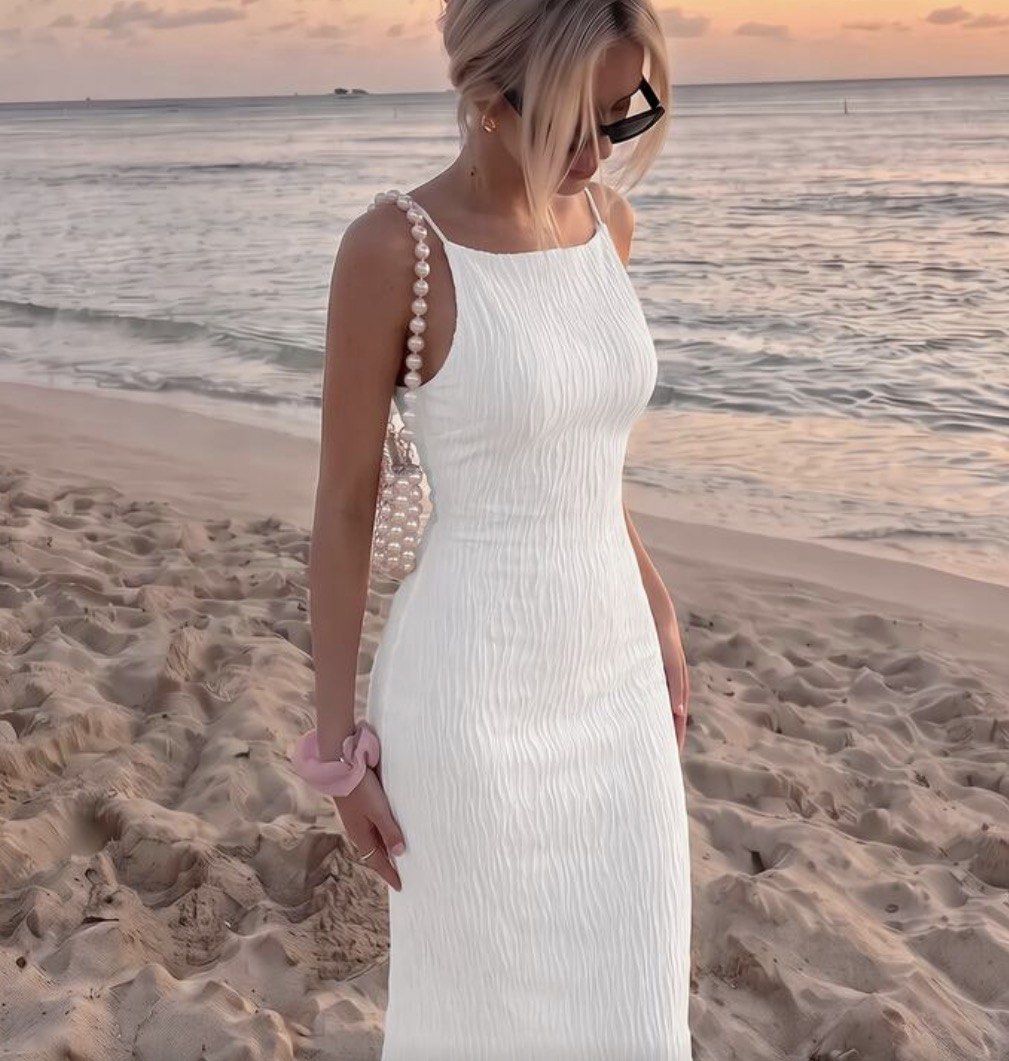 🦢 WHITE MAXI DRESS (Category: Dresses) located in Manila. Submitted by alionyyy (Listing ID 1470787498, Image 1). Description: 🪩 used only twice, can fit xs-s 📍 UST, MANILA - Color: White - Style: Sleeveless maxi dress with a clean, minimalist design - Fit: Slim bodycon fit that hugs curves down to the ankles - Details: All-over textured wavy pattern, straight boat neckline, and thin straps - Material: Stretchy and comfortable fabric - Ideal f