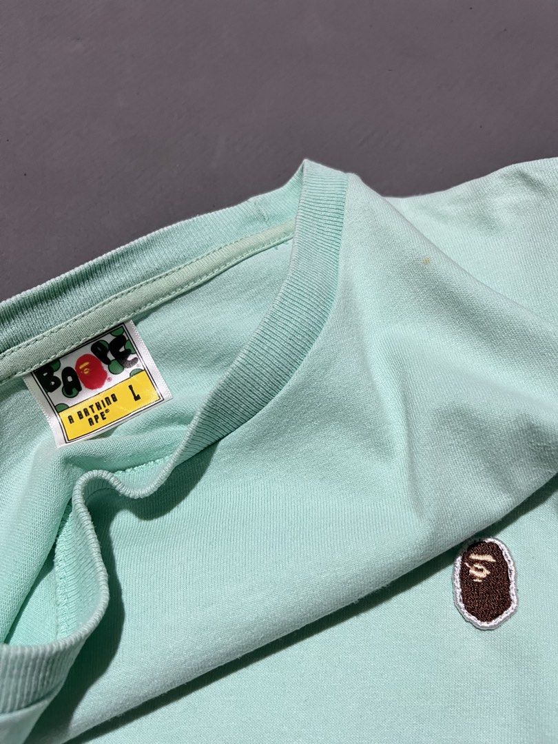 A bathing ape (Category: Formal Shirts) located in Manila. Submitted by lardo.599 (Listing ID 1470871023, Image 2). Description: Size L Issue small yellow stain washable Color rate 10/10 Condition 10/10.