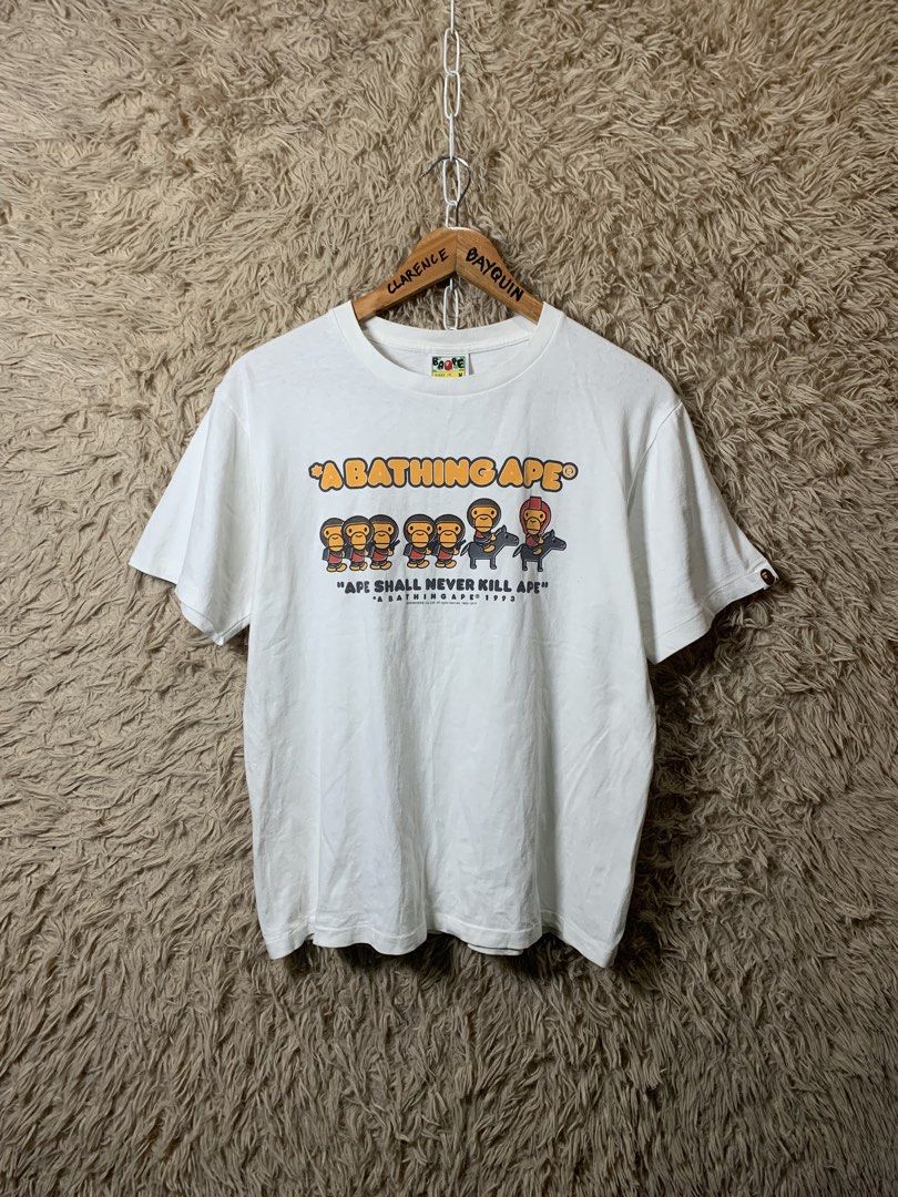 A Bathing Ape Ape Shall Never Kill Ape T-Shirt (Category: Tshirts & Polo Shirts ) located in Cotabato. Submitted by clarence0918 (Listing ID 1470857495, Image 1). Description: Bà Pé(authentic legit) Size medium on tag 20.5x26 Very Good condition 9.8/10 Color rate Pinhole sa hem and minimal hairlines.
