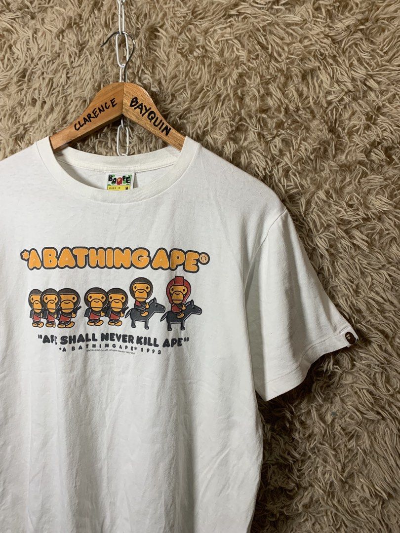 A Bathing Ape Ape Shall Never Kill Ape T-Shirt (Category: Tshirts & Polo Shirts ) located in Cotabato. Submitted by clarence0918 (Listing ID 1470857495, Image 2). Description: Bà Pé(authentic legit) Size medium on tag 20.5x26 Very Good condition 9.8/10 Color rate Pinhole sa hem and minimal hairlines.