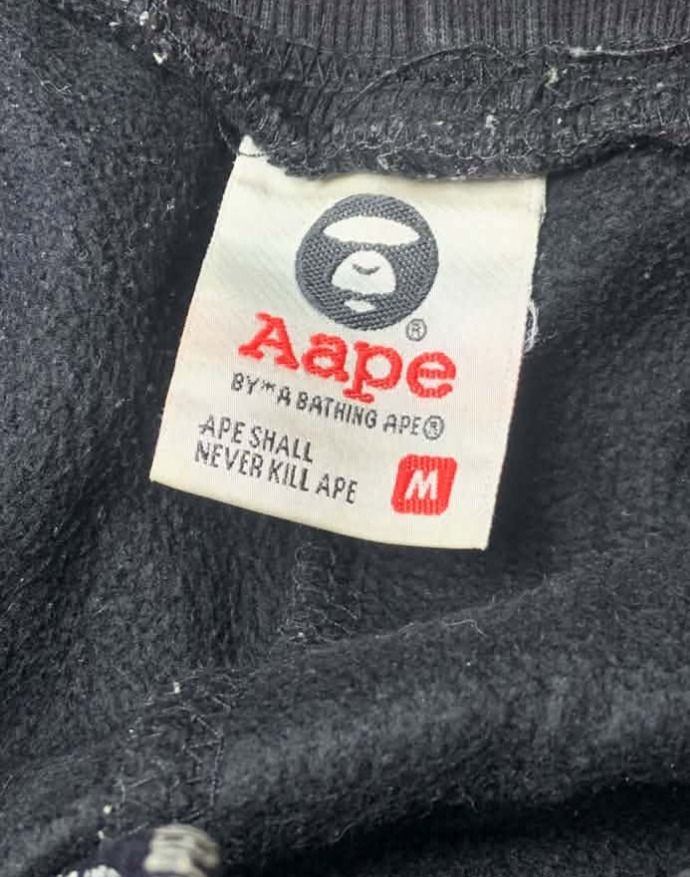 aape balck pants (Category: Joggers) located in Paranaque City. Submitted by thrift_in_the_hoods (Listing ID 1470931429, Image 3). Description: waist: 30-32 length: 37.