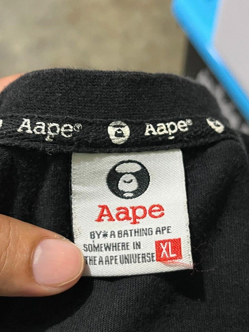 AAPE MOONFACE LOGO SHIRT (Category: Tshirts & Polo Shirts ) located in Davao. Submitted by blazing.rachel02 (Listing ID 1470849094, Image 2). Description: XL on tag 19 x 28 (fits small to medium) Color rate: 9.8/10 Excellent condition No issue.