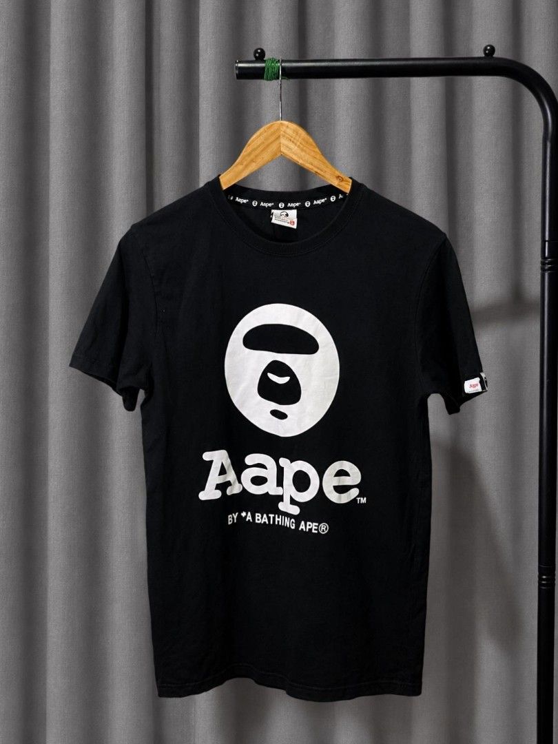 AAPE MOONFACE LOGO SHIRT (Category: Tshirts & Polo Shirts ) located in Davao. Submitted by blazing.rachel02 (Listing ID 1470849094, Image 1). Description: XL on tag 19 x 28 (fits small to medium) Color rate: 9.8/10 Excellent condition No issue.