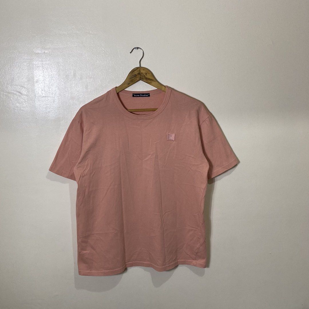 Acne Studios Fello Face Face-Patch T-Shirt Pink Medium (Category: Tshirts & Polo Shirts ) located in Manila. Submitted by carbertjakosalem (Listing ID 1470921280, Image 1). Description: - Brand: Acne Studios - Item: Face-Patch Tee - Color: Pink - Size: M - Material: 100% Cotton (Made in Portugal) - Fit: Regular fit, soft fabric - Design: Classic crew neck with signature minimalist face logo on chest - Condition: Clean inside tags and neck label.