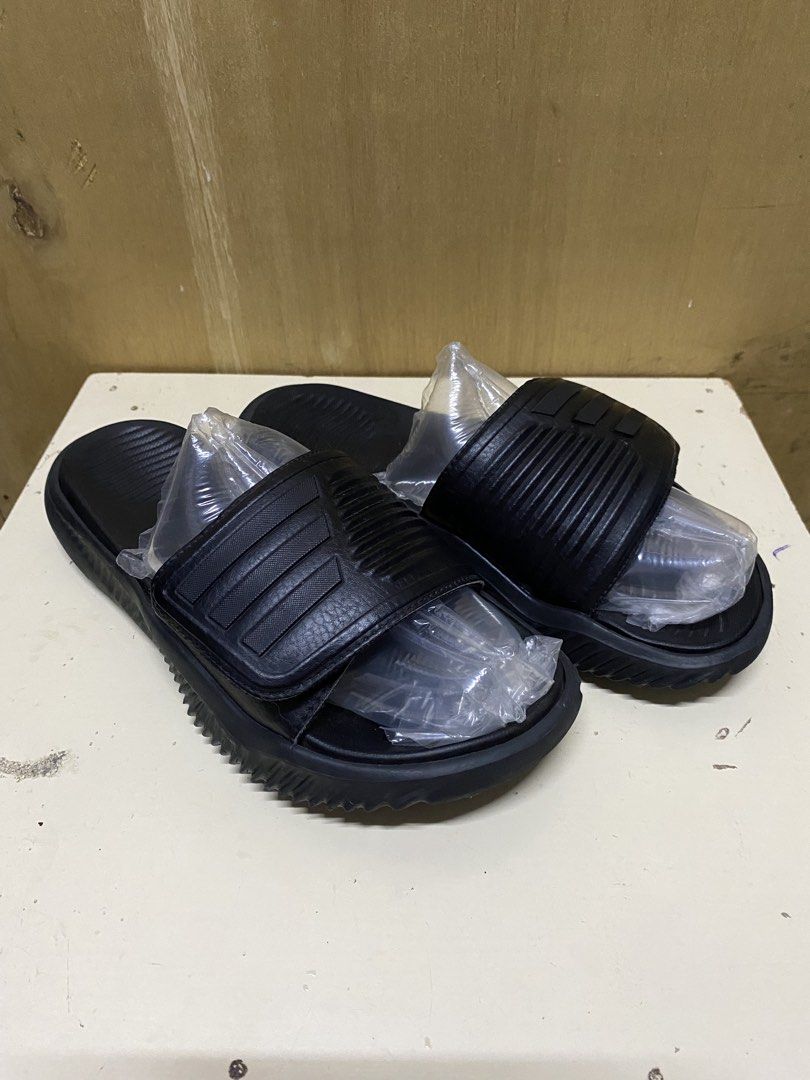 Adidas Alphabounce Slide 2.0 (Category: Slippers & Slides) located in Bayombong. Submitted by fliptique (Listing ID 1470834757, Image 3). Description: Adidas Alphabounce Slide 2.0 (Black) Very Good Condition Original/Authentic Pre-owned Slides Not Thrifted Size : US: 7 UK : 7 FR : 40 1/2 JP : 255 CHN : 250 Made : Vietnam Color Rate : 10 Issue : Minimal Scratches (see last pic) ₱1300 + sf 📩Hit A Message If Interested Note : (The Slides Is Size 7 