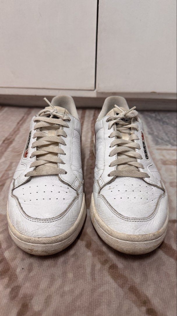 Adidas Continental 80 – White | US 10 (Category: Sneakers) located in Manila. Submitted by mbandrada18 (Listing ID 1470825613, Image 2). Description: Adidas Continental – White | US 10 Details: • Size: US 10 • Colorway: White with red accents • No sole separation • Pre-loved condition with visible signs of use; please refer to the photos 💰 Price: ₱ 1,000 📍 Location: Marikina City Message me if interested. Thank you!.