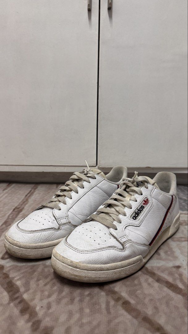 Adidas Continental 80 – White | US 10 (Category: Sneakers) located in Manila. Submitted by mbandrada18 (Listing ID 1470825613, Image 1). Description: Adidas Continental – White | US 10 Details: • Size: US 10 • Colorway: White with red accents • No sole separation • Pre-loved condition with visible signs of use; please refer to the photos 💰 Price: ₱ 1,000 📍 Location: Marikina City Message me if interested. Thank you!.