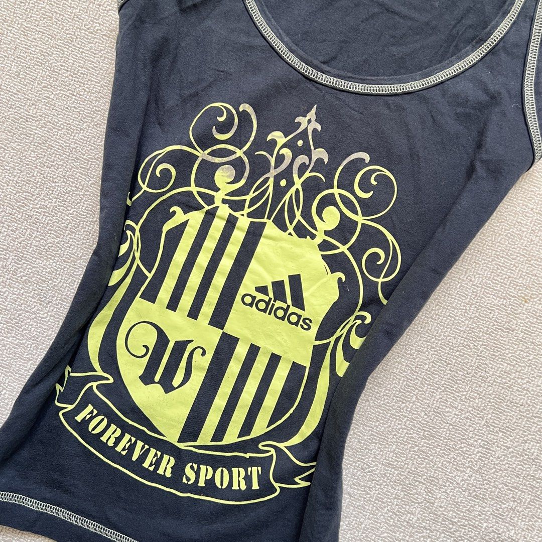 adidas forever sport tank top (Category: Sleeveless) located in Limay. Submitted by budolfindsrawrawr (Listing ID 1470752401, Image 3). Description: adid4s forever sport tank top - m on tag l22 b36 - vintage dated 03/06 - some black ink to its print.