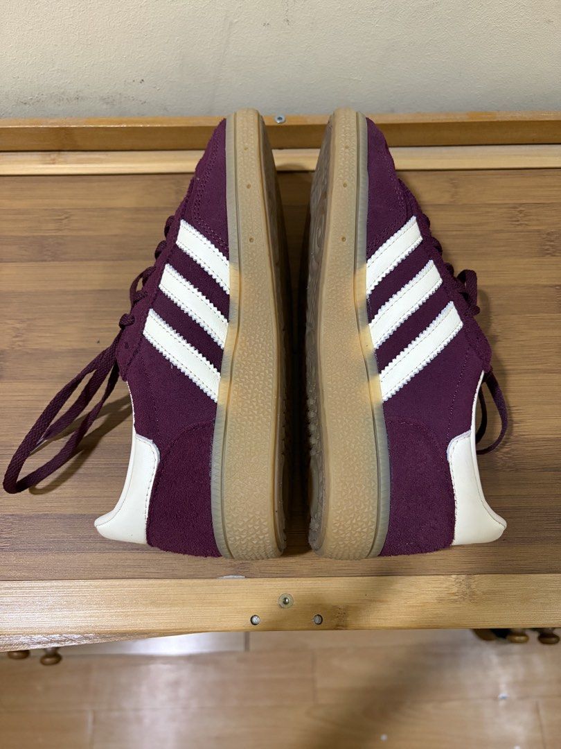 Adidas Handball Spezial (Category: Sneakers) located in San Pedro. Submitted by nikkiabc.777 (Listing ID 1470755755, Image 2). Description: Adidas Handball Spezial Shoes Color: Maroon/Cream White/ Gold Metallic Size: US-Women 5 US-Men 4 EU 36 UK 3.5 Heel - toe (cm) 22.1 cm Heel - toe (inch) 8.7" True to size. Bought from Adidas Ayala Malls Manila Bay Bought for ₱5,800 With box. No flaws. RFS: decluttering Location: San Pedro, Laguna.