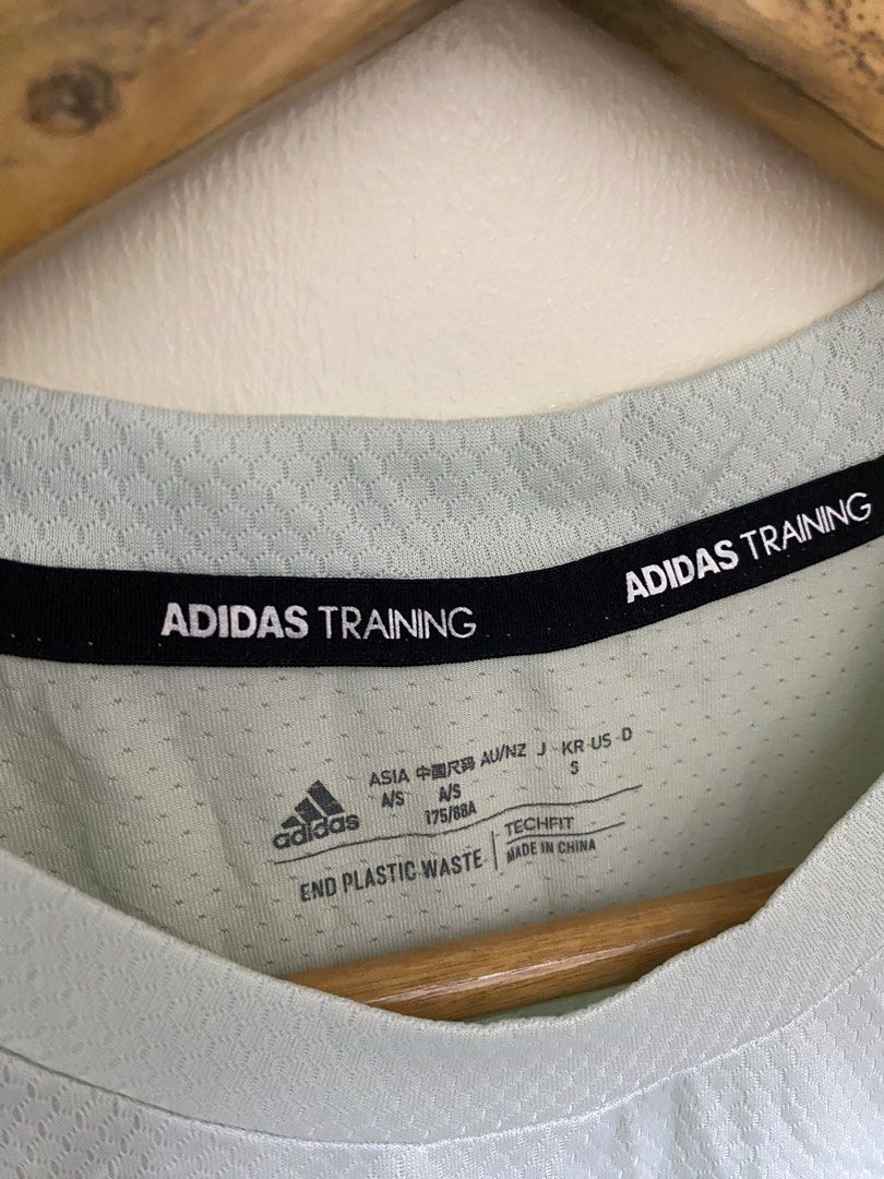 Adidas HIIT Spin Training Tee Mint Green Size S (Category: Activewear) located in Cebu City. Submitted by theloose.thread (Listing ID 1470917867, Image 3). Description: - Brand: Adidas HIIT Spin Tee - Color: Light Mint Green - Size: S (175/88A chest measurement) - Material: Recycled polyester and elastane blend with breathable mesh panels (Techfit design) - Sustainability: Part of the End Plastic Waste collection - Details: Black Adidas Training 