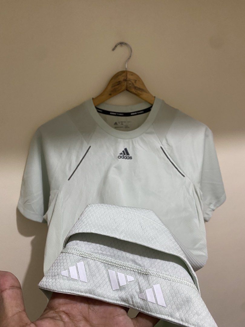 Adidas HIIT Spin Training Tee Mint Green Size S (Category: Activewear) located in Cebu City. Submitted by theloose.thread (Listing ID 1470917867, Image 2). Description: - Brand: Adidas HIIT Spin Tee - Color: Light Mint Green - Size: S (175/88A chest measurement) - Material: Recycled polyester and elastane blend with breathable mesh panels (Techfit design) - Sustainability: Part of the End Plastic Waste collection - Details: Black Adidas Training 