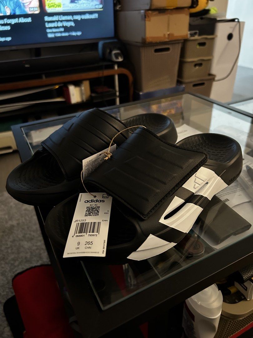 Adidas Lightblaze Slide Black White Size 9 UK (Category: Slippers & Slides) located in Paranaque City. Submitted by ali3n23 (Listing ID 1470751261, Image 1). Description: - Brand: Adidas Lightblaze Slide - Colorway: Core Black and White - Size: UK 9 / US 9 / EU 43 / CHN 265 - Condition: Brand new with original tags attached - Packaging: Original shoe box included - Features: Comfortable slip-on design with bold branding -RFS: change size -limited