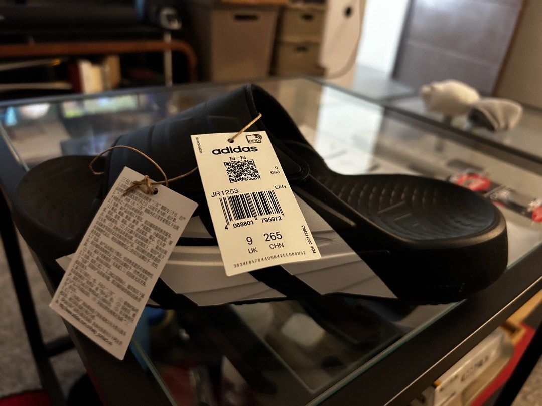 Adidas Lightblaze Slide Black White Size 9 UK (Category: Slippers & Slides) located in Paranaque City. Submitted by ali3n23 (Listing ID 1470751261, Image 2). Description: - Brand: Adidas Lightblaze Slide - Colorway: Core Black and White - Size: UK 9 / US 9 / EU 43 / CHN 265 - Condition: Brand new with original tags attached - Packaging: Original shoe box included - Features: Comfortable slip-on design with bold branding -RFS: change size -limited