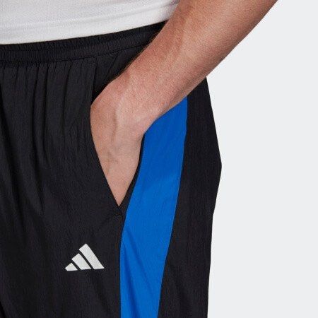 ADIDAS Logo Woven Track Pants (Category: Trousers) located in Cavite. Submitted by second_story_ph (Listing ID 1470834831, Image 2). Description: ADIDAS Logo Woven Track Pants Size: Medium 15” Waistline stretchable 40” Length Condition: Like New.
