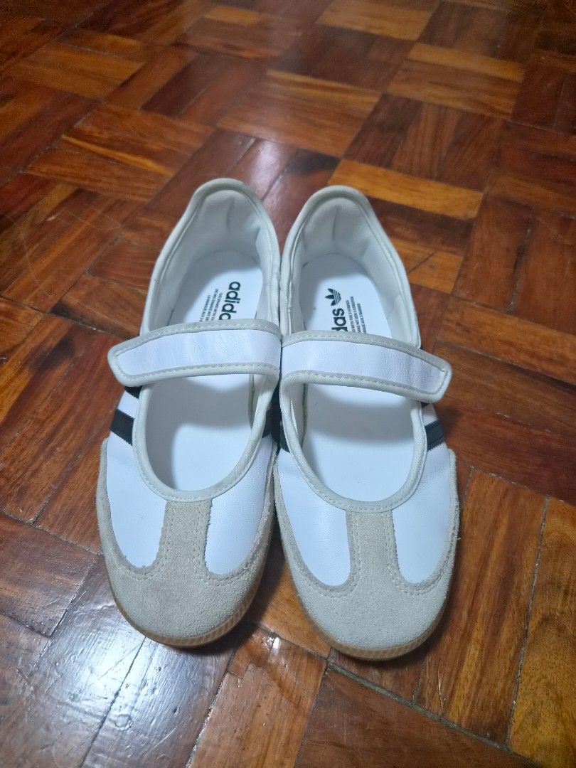 Adidas Samba Mary Jane White Black (Category: Sneakers) located in Quezon City. Submitted by mimi0024 (Listing ID 1470802685, Image 1). Description: - Model: Adidas Samba Mary Jane - Colorway: White and Black - Size: US 8 | UK 6.5 | FR 40 | JP 250 | CHN 245 - Closure: Velcro strap across the top - Details: Suede toe overlay, classic gum sole, branded white insoles.