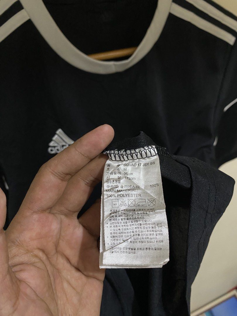 Adidas Squad 17 Jersey Black White Size M (Category: Activewear) located in Manila. Submitted by carbertjakosalem (Listing ID 1470921403, Image 2). Description: - Brand: Adidas - Model: Squad 17 Jersey (Product Code: BJ9173) - Color: Black with white details - Size: Medium (Chest: 95cm, Height: 173cm) - Material: 100% Polyester with Climalite technology - Condition: Excellent, manufactured 12/18 - Features: Short sleeves and round collar.