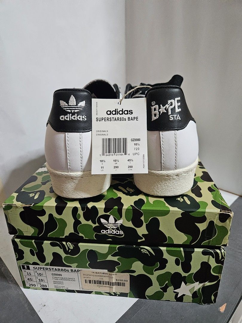 Adidas Superstar x Bape 'White/Black' (Category: Sneakers) located in Manila. Submitted by gcv237. (Listing ID 1470884844, Image 3). Description: Adidas Superstar x Bape 'White/Black' GZ8980 ✅💯 Original Original Box w/ Extra Lace and Wrapper ➕ Stock X tag Price: 7,500 (negotiable) Size: US - 11 / FR - 45 Condition: 9/10 As good as new No Heel Drag MOD: Lalamove or Grab | Meetup MOP: Gcash or Cash PM for more inquiries Can send more pictures 🖼️ 