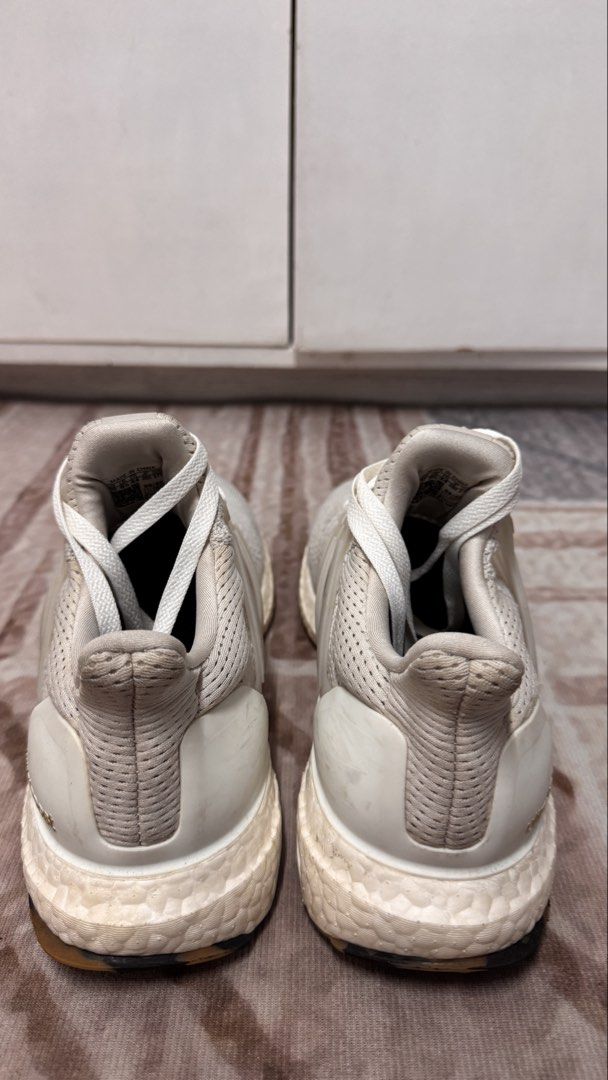 Adidas Ultraboost – White | US 10 (Category: Sneakers) located in Manila. Submitted by mbandrada18 (Listing ID 1470825797, Image 3). Description: Adidas Ultraboost – White | US 10 Selling my pre-loved Adidas Ultraboost in a neutral white and cream colorway. A versatile option for everyday wear, walking, and casual styling. Details: • Size: US 10 • Colorway: White • No sole separation • Pre-loved condition; please see photos for actual condition �