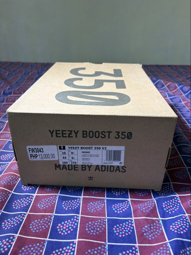 Adidas Yeezy Boost 350 V2 Cloud White size US 10 (Category: Sneakers) located in Manila. Submitted by dailystuff.ph (Listing ID 1470755753, Image 2). Description: - Model: Adidas Yeezy Boost 350 V2 Cloud White - Size: US 10 / UK 9.5 / EU 44 - Condition: Lightly worn, clean insoles and soles (has sole protect since bought until now), slight midsole yellowing - Features: Primeknit upper and translucent gum sole - Inclusions: Original box, store tag