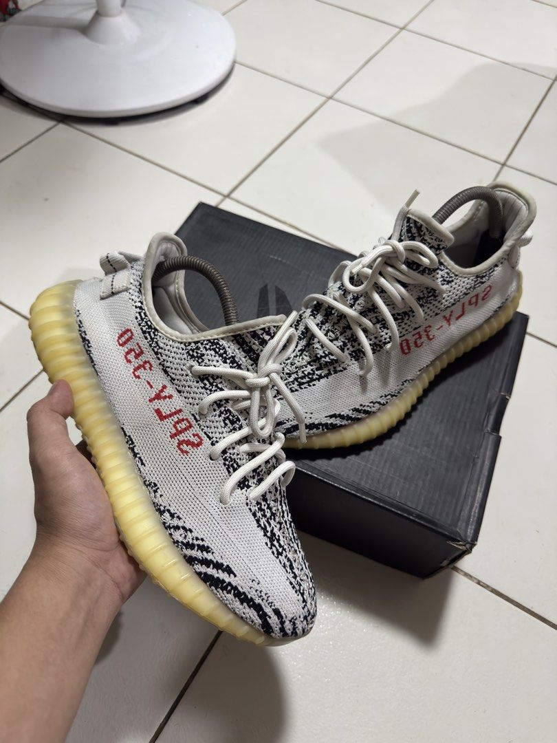 Adidas Yeezy Boost 350 V2 Zebra (Category: Sneakers) located in Manila. Submitted by mislangers_stuff (Listing ID 1470852619, Image 1). Description: - Item: Adidas Yeezy Boost 350 V2 (Zebra) - Condition: Worn a few times, very clean uppers - Note: Translucent midsole shows natural yellowing over time - Inclusions: White laces, shoe trees included, and original black box - Meet-ups and shipping available across PH.