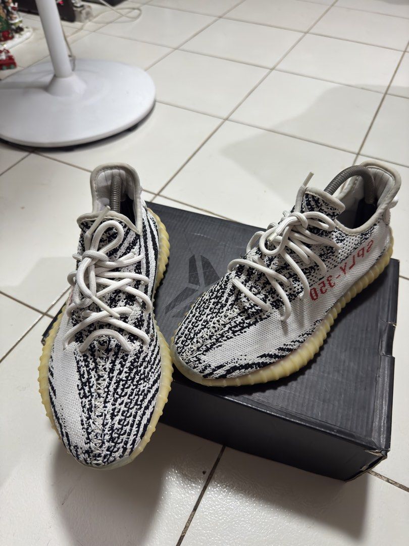 Adidas Yeezy Boost 350 V2 Zebra (Category: Sneakers) located in Manila. Submitted by mislangers_stuff (Listing ID 1470852619, Image 2). Description: - Item: Adidas Yeezy Boost 350 V2 (Zebra) - Condition: Worn a few times, very clean uppers - Note: Translucent midsole shows natural yellowing over time - Inclusions: White laces, shoe trees included, and original black box - Meet-ups and shipping available across PH.