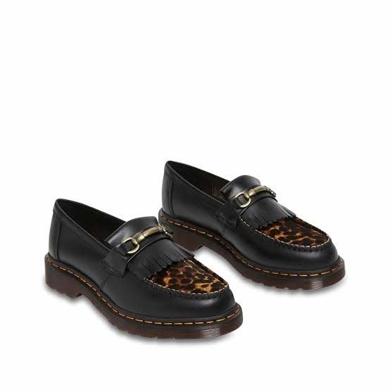 Adrian SnaffleHair On Loafers (Category: Loafers) located in Pasig City. Submitted by dporcincula (Listing ID 1470818855, Image 1). Description: - Style: Slip-on loafers with fringe detail - Material: Black smooth leather and leopard print calf hair panels - Hardware: Antique brass with horsebit accent - Details: Distinctive yellow stitching along the welt - Sole: Chunky dark brown soles for comfort and height - Condition: Excellent / Ready to we