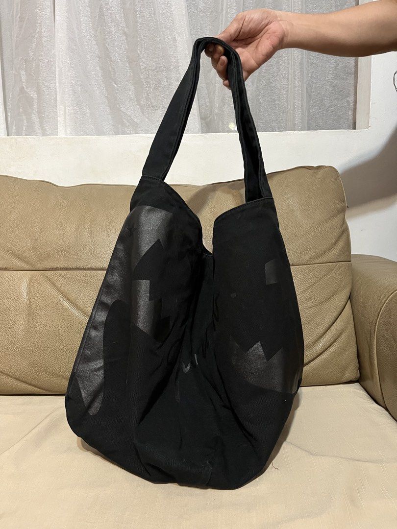 Agnes b. Black Canvas Tote Bag (Category: Tote Bags) located in Calamba. Submitted by jupreloved_ (Listing ID 1470791979, Image 1). Description: Authentic Sport b. by Agnes b. black canvas tote bag. Spacious, slouchy everyday shoulder bag made of 100% cotton with a clean interior zipper pocket. Brand: Agnes b. Size: Extra Large Shipping through J&T. Payment are strictly through GCASH only, no COD. Exact size and color may be different from the pi