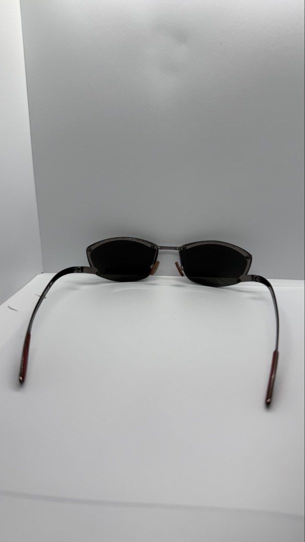 Agnes b. Fire L616 Sunglasses (Category: Sunglasses & Eyewear) located in Baguio. Submitted by zeemoda01 (Listing ID 1470886542, Image 2). Description: - Brand: Agnes b. - Model: AB FIRE L616 125 - Lenses: Dark tinted - Frame: Sleek dark metallic with trendy red arm tips - Temple Length: 125 - Condition: Clean, excellent, minimal wear visible - Perfect for everyday wear and stylish sun protection.
