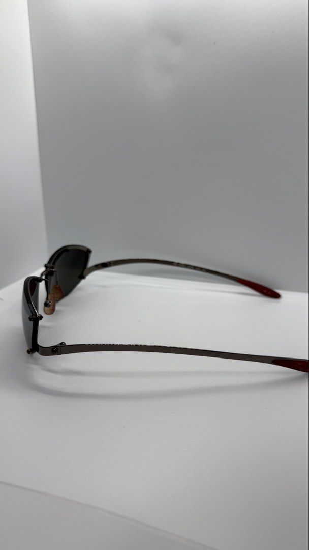 Agnes b. Fire L616 Sunglasses (Category: Sunglasses & Eyewear) located in Baguio. Submitted by zeemoda01 (Listing ID 1470886542, Image 3). Description: - Brand: Agnes b. - Model: AB FIRE L616 125 - Lenses: Dark tinted - Frame: Sleek dark metallic with trendy red arm tips - Temple Length: 125 - Condition: Clean, excellent, minimal wear visible - Perfect for everyday wear and stylish sun protection.