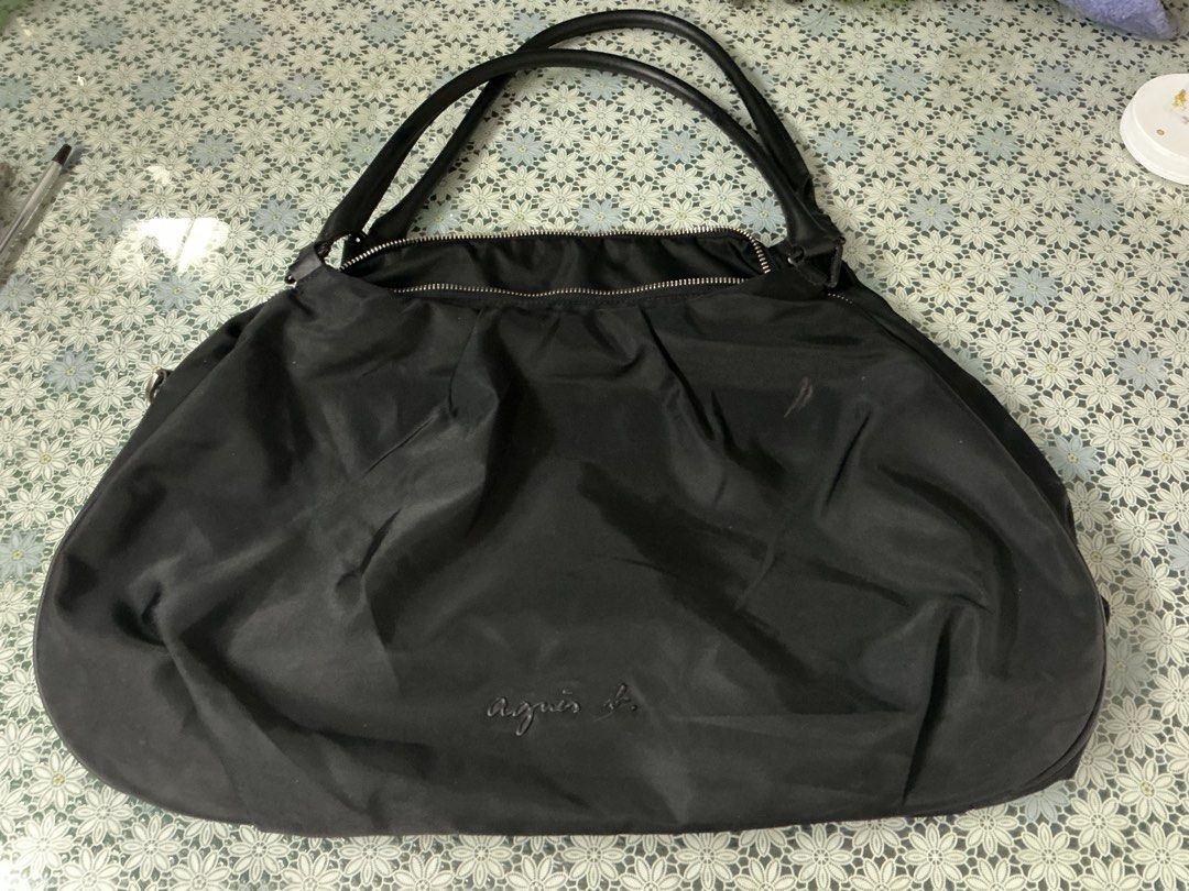 Agnes b large shoulder bag (Category: Shoulder Bags) located in Angeles City. Submitted by goodbuysathome (Listing ID 1470754628, Image 2). Description: Auth Agnes B black shoulder bag Large with lots of compartments Slight scratches s handle signs of use Add Sf 70 Gcash payment Lp npo.