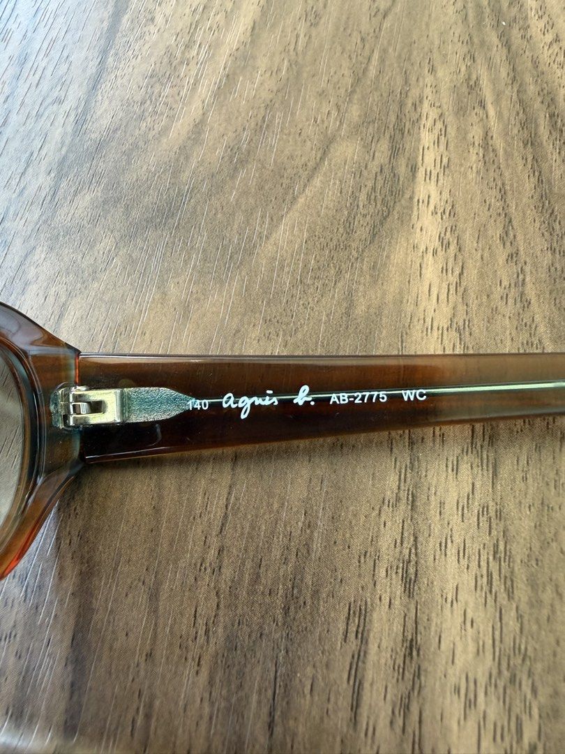 Vintage Agnès b. AB-2775 Sunglasses Tortoise Shell (Category: Sunglasses & Eyewear) located in Digos. Submitted by old_soul. (Listing ID 1470793197, Image 2). Description: Collector’s item!!! - Brand: Agnès b. - Model: AB-2775 - Color: Gradient tortoise shell brown (amber to dark translucent) - Lenses: Gradient brown tinted - Dimensions: Lens width 57mm, Bridge 16mm, Temple length 140mm - Details: Signature script logo and iconic three white star