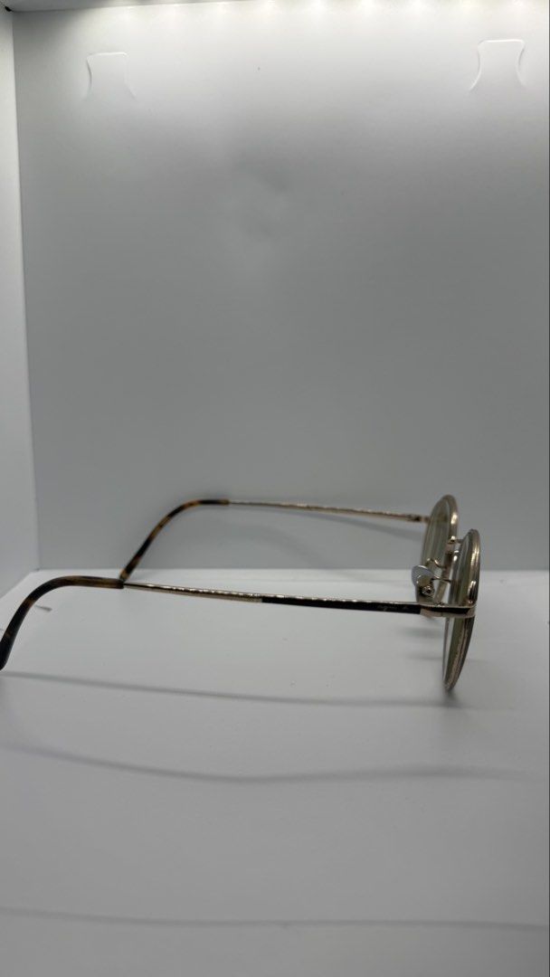 agnès b. round gold metal eyeglasses frames (Category: Sunglasses & Eyewear) located in Baguio. Submitted by zeemoda01 (Listing ID 1470886921, Image 2). Description: - with grade needs to be replaced Brand: agnès b. - Style: Round metal eyeglasses - Color: Rose gold frames with tortoiseshell acetate temple tips - Details: Delicate metal work on brow line and bridge, engraved "b. YOURSELF!!" on temple arm - Fit: Lightweight everyday frame design.