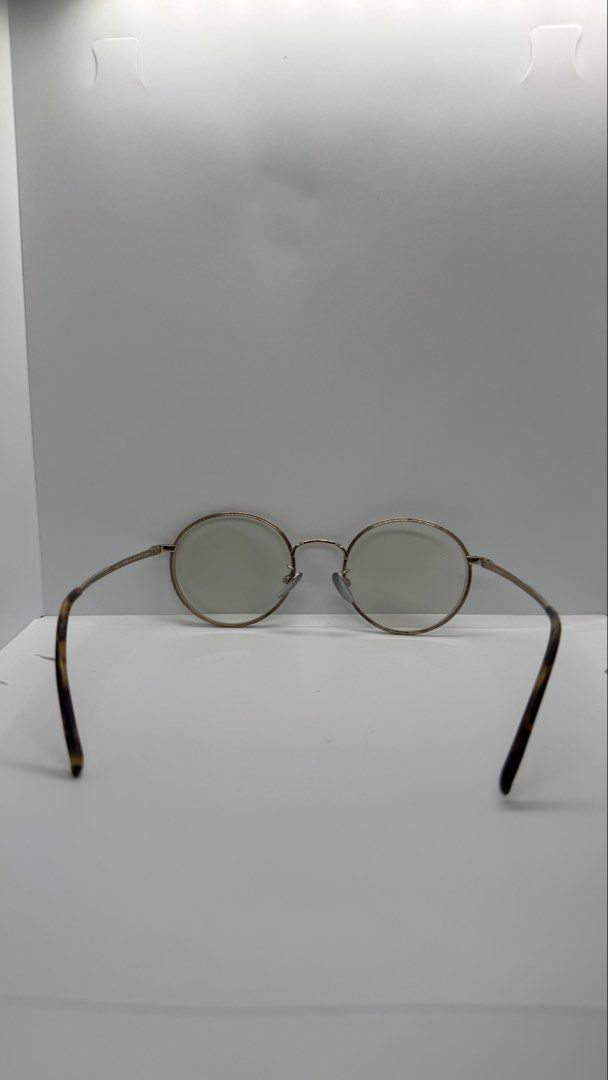 agnès b. round gold metal eyeglasses frames (Category: Sunglasses & Eyewear) located in Baguio. Submitted by zeemoda01 (Listing ID 1470886921, Image 3). Description: - with grade needs to be replaced Brand: agnès b. - Style: Round metal eyeglasses - Color: Rose gold frames with tortoiseshell acetate temple tips - Details: Delicate metal work on brow line and bridge, engraved "b. YOURSELF!!" on temple arm - Fit: Lightweight everyday frame design.