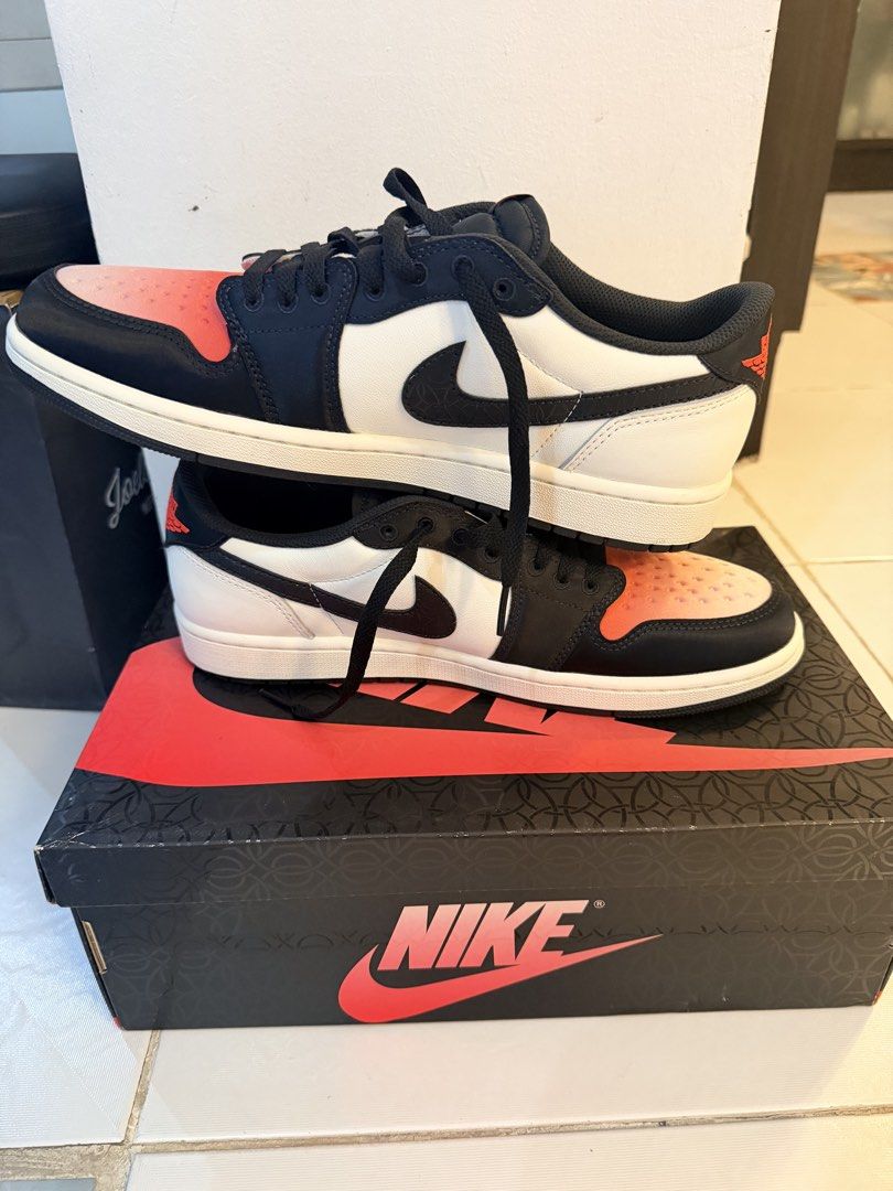 Air Jordan 1 Low OG PSG (Category: Sneakers) located in Quezon City. Submitted by ponchcan (Listing ID 1470834157, Image 3). Description: - Model: Air Jordan 1 Low Paris Edition - Condition: Brand new-like with zero wear, clean outsoles - Design: White leather upper, black overlays, and pink gradient toe box - Details: Paris branding on the tongue tag and custom insoles - Packaging: Includes original graphic shoebox - Trusted Carousell Seller: Bu