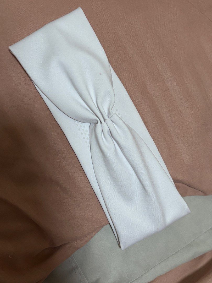 Alo Yoga White Headband (Category: Hair Accessories) located in Quezon City. Submitted by hscherryy (Listing ID 1470865702, Image 2). Description: bought for almost 2500 from LA. has small flaws as seen in photos because headband is white. used twice only.