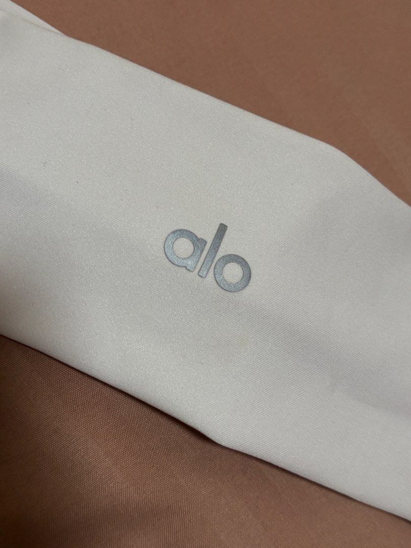 Alo Yoga White Headband (Category: Hair Accessories) located in Quezon City. Submitted by hscherryy (Listing ID 1470865702, Image 1). Description: bought for almost 2500 from LA. has small flaws as seen in photos because headband is white. used twice only.
