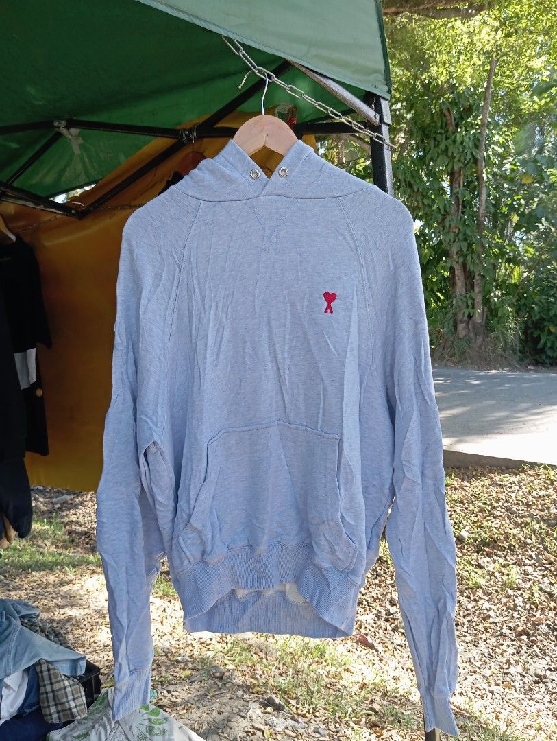 Ami Paris Light Blue Hoodie Size S (Category: Coats, Jackets and Outerwear) located in Manila. Submitted by jzk25 (Listing ID 1470747720, Image 1). Description: - Brand: Ami Paris - Item: Light blue hoodie - Size: Small (tag attached) - Details: Signature red embroidered heart logo on chest, front kangaroo pocket, ribbed cuffs and hem - Condition: Clean fabric inside and out, well-maintained - Shipping: Ships out fast from a trusted PH seller! Fe