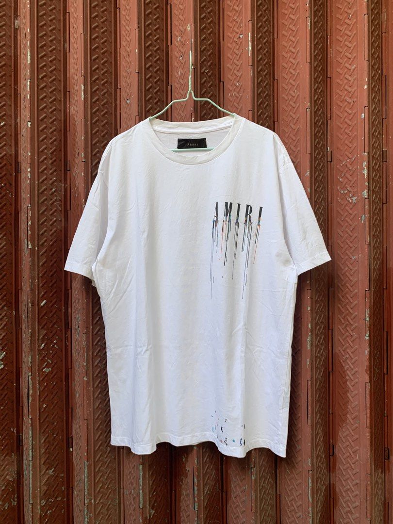 Amiri Modern Paint Drip Logo T-Shirt (Category: Tshirts & Polo Shirts ) located in Buhi. Submitted by __sibol (Listing ID 1470815809, Image 1). Description: Amiri Modern Paint Drip Logo T-Shirt Measurements: Width: 22.5” Length: 29”.