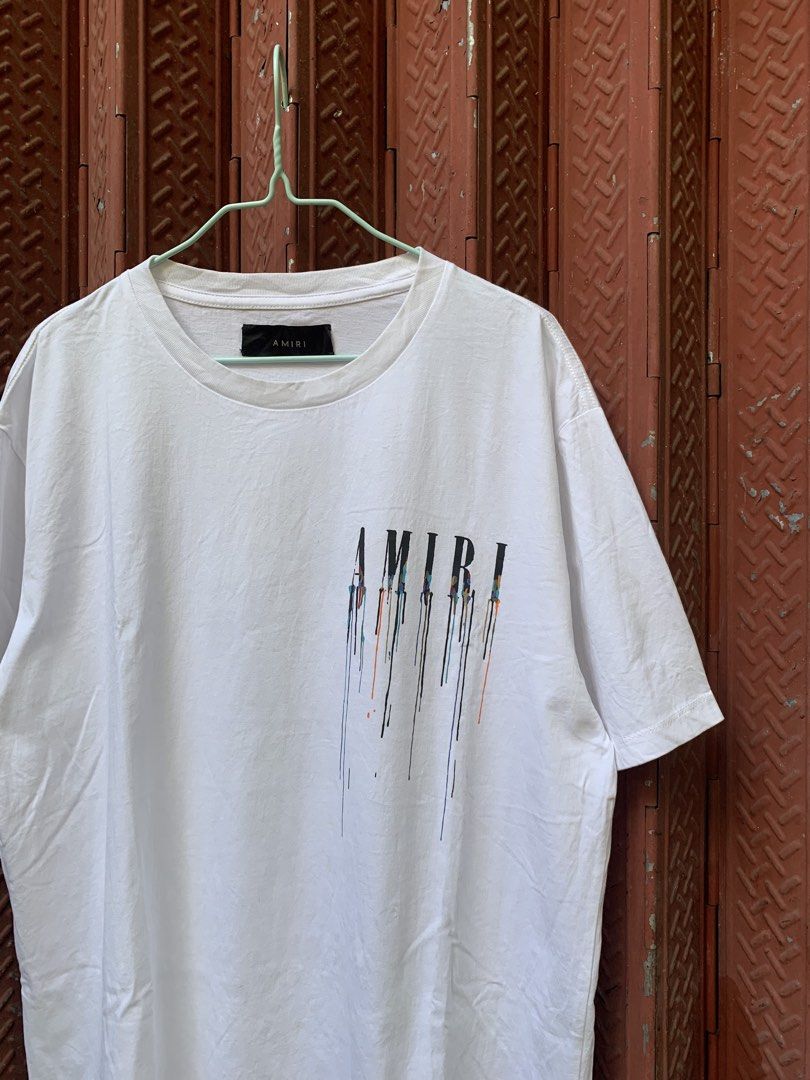 Amiri Modern Paint Drip Logo T-Shirt (Category: Tshirts & Polo Shirts ) located in Buhi. Submitted by __sibol (Listing ID 1470815809, Image 3). Description: Amiri Modern Paint Drip Logo T-Shirt Measurements: Width: 22.5” Length: 29”.