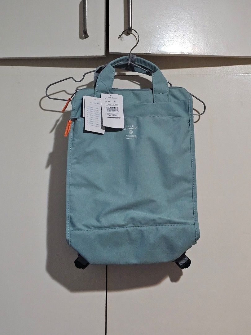 Anello GRANDE Cabin A4 Tote-type Backpack (Category: Backpacks) located in Paranaque City. Submitted by mab.villareal (Listing ID 1470826317, Image 2). Description: Anello Grande backpack in MGR colorway. Capacity is 13 liters. Original tags still attached, never used. Mint green fabric with top handle and adjustable padded shoulder straps. Front zipper pocket and water-resistant finish. Japan bought.