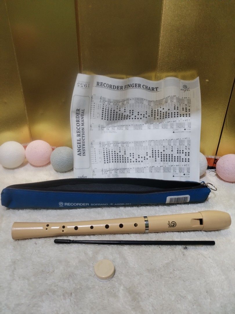 Angel Soprano Recorder ASRB-351 with Case and Chart (Category: Musical Instruments) located in La Trinidad. Submitted by malditas (Listing ID 1470897966, Image 1). Description: - Model: Angel Soprano Recorder ASRB-351 - Color: Classic light beige, 3-piece standard plastic construction - Includes: Blue zippered storage case, cleaning rod, and mouthpiece cap - Extras: Original instruction manual featuring a complete finger chart - Perfect for: Musi