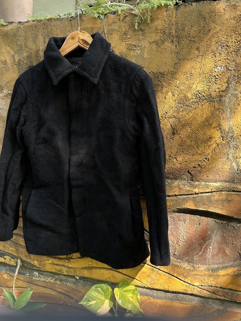 A.P.C. Paris Black Wool Textured Hidden Button Coat (Category: Coats, Jackets and Outerwear) located in Urdaneta. Submitted by redeemedcollective (Listing ID 1470868432, Image 2). Description: A.P.C. Paris Wool Coat Minimalist black wool coat from French fashion label A.P.C., featuring a textured exterior, structured collar, and concealed front button closure. • Black textured wool exterior • 100% wool • Made in France • Concealed button-front cl