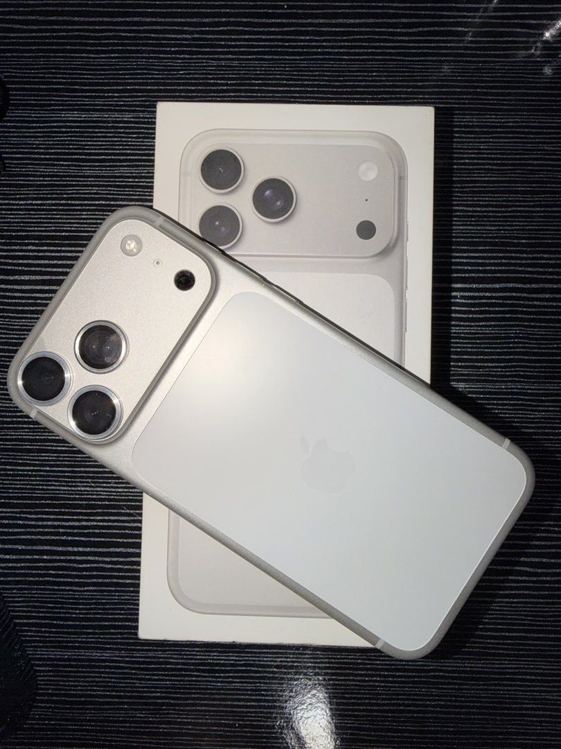 Apple iPhone 17 Pro Max with box (Category: iPhone 17 Series) located in Mandaluyong City. Submitted by oreotheshihtzu (Listing ID 1470930309, Image 1). Description: - Color: Natural Titanium - Camera: Triple camera setup - Port: USB-C charging port - Inclusions: Original retail box - Condition: fully functional and working normally.