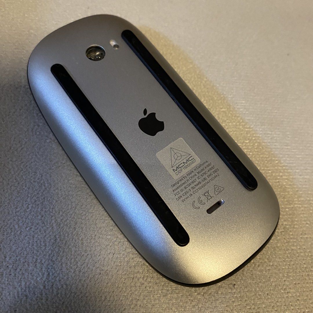Apple Magic Mouse 2 Black (Category: Mouse & Mousepads) located in Santa Rosa. Submitted by dasha07 (Listing ID 1470869155, Image 3). Description: - Authentic Apple Wireless Mouse (Model A1657) - Sleek space grey finish with a stylish black top shell - Multi-touch surface supporting smooth gesture controls - Built-in rechargeable battery charged via Lightning port - Easy Bluetooth pairing with Mac and iPad - Clean overall condition.
